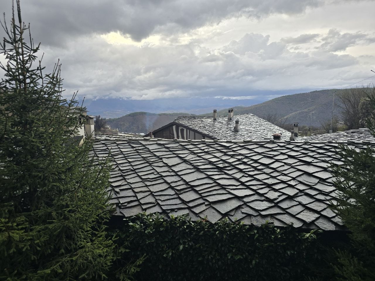 The Amexis 20th birthday cake — 20 Years, 20 Peaks — with branded champagne bottles