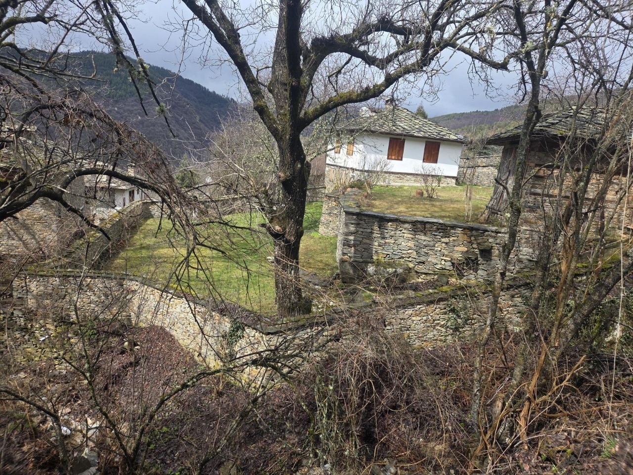 Traditional slate rooftops of Kovachevitsa with mountain views